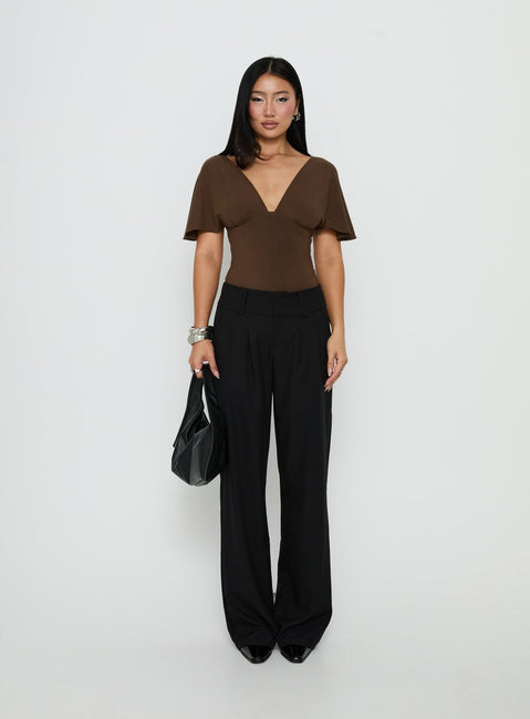 Crafted from saddle brown fabric, the Yevenna Batwing Plunge Bodysuit Chocolate womens-bodysuit features short sleeves product Princess Polly