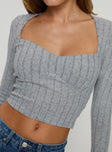 Long sleeve top Knit material, sweetheart neckline, slim fit, slight flare in sleeve Good stretch, lined bust 