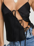 Cami top Fixed shoulder straps, cut out detail with adjustable tie fastenings Non-stretch material, lined bust
