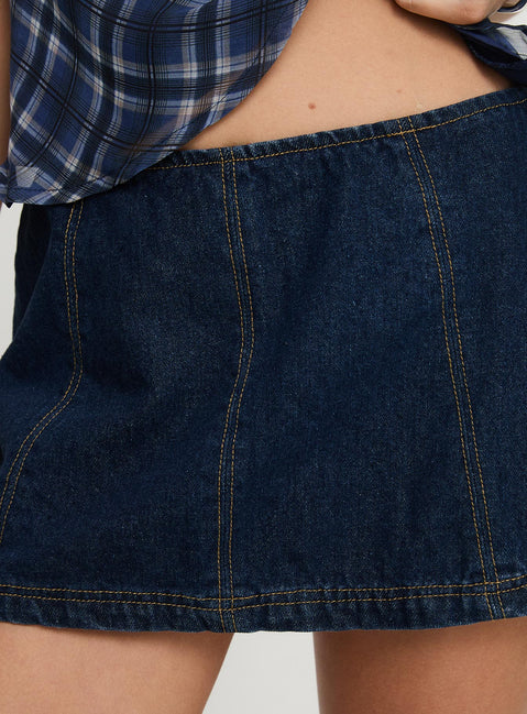 back view of model wearing Princess Polly Lemoni Skort Denim Mid Wash Tall Low Rise Shorts 