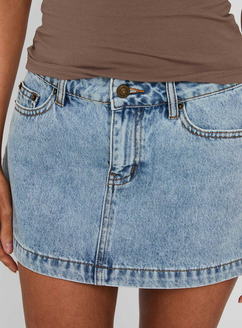 back view of model wearing Princess Polly Nicolina Low Rise Denim Mini Skirt Ice Blue Wash Tall Mini Skirts 