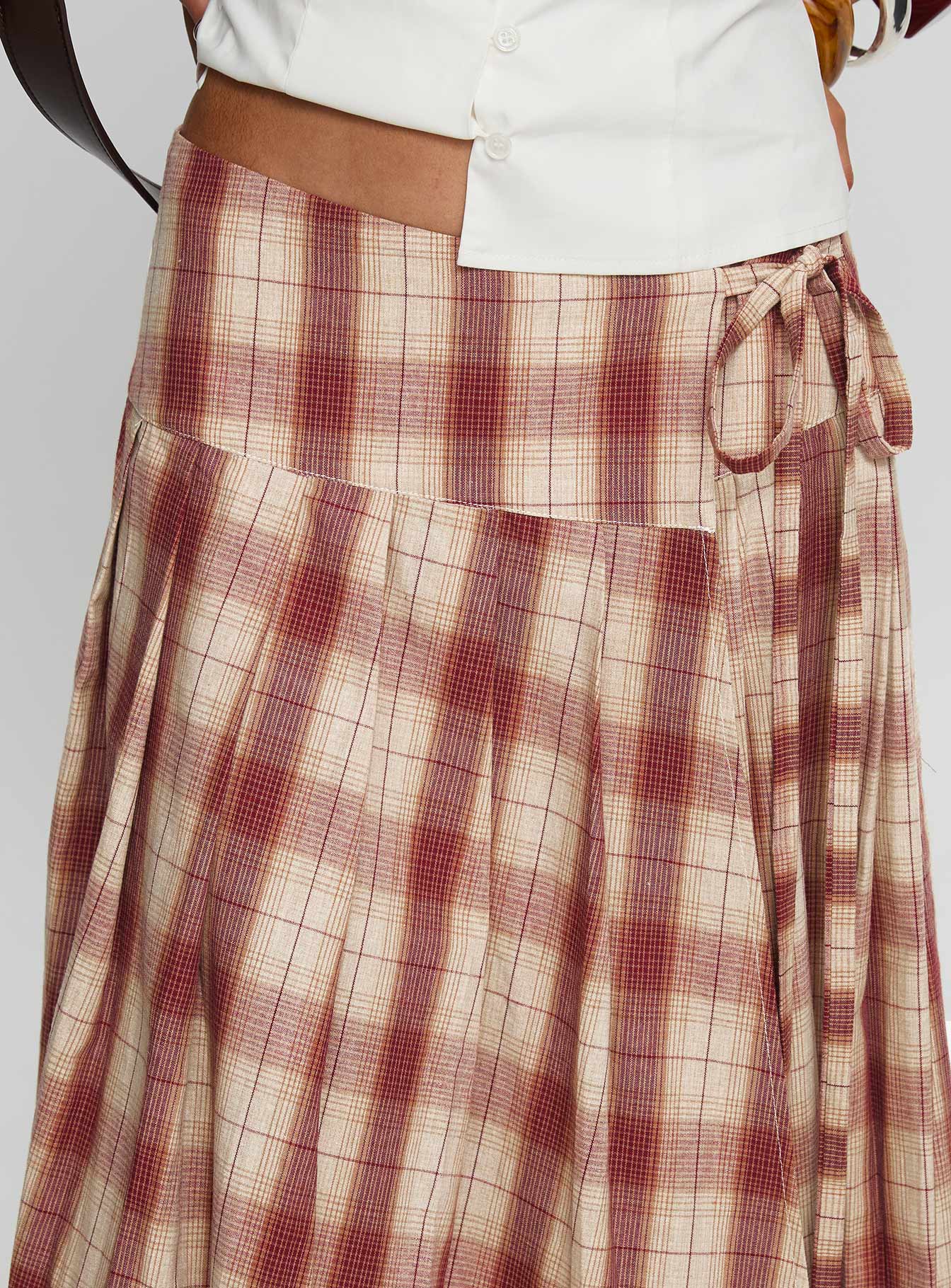 back view of model wearing Princess Polly Norie Wrap Pleat Midi Skirt Red Plaid Midi Skirts Skirts 