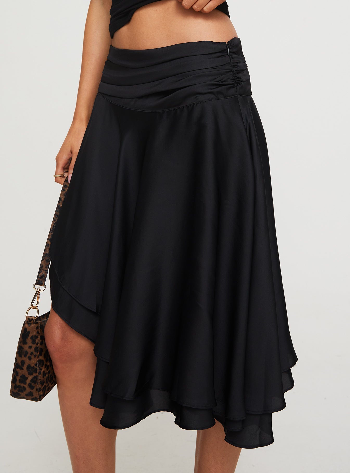   side view of model wearing Princess Polly Legacy Midi Skirt Onyx Midi Skirts 