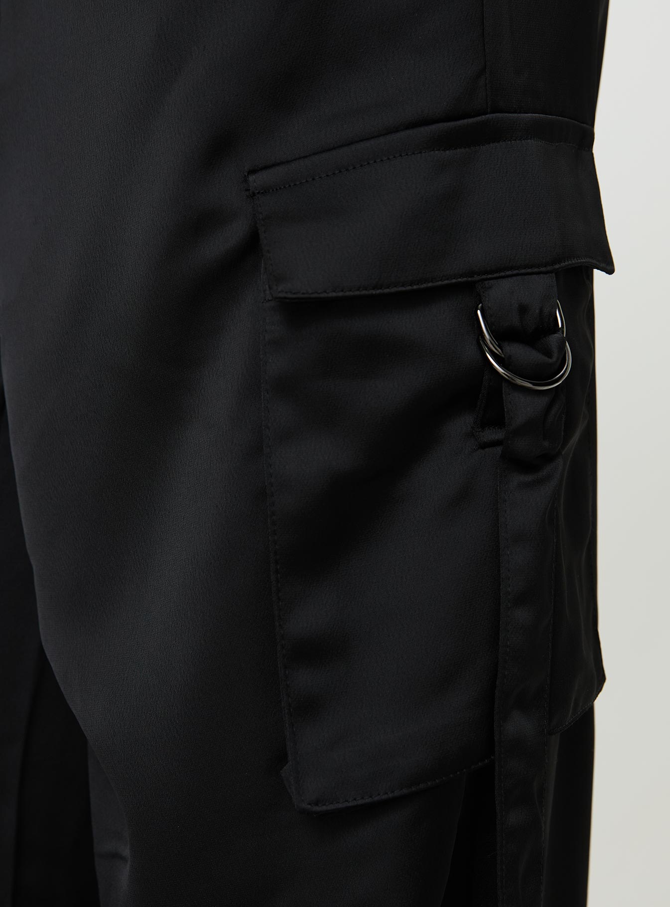 back view of model wearing Princess Polly Butterfly Cargo Pants Onyx High Waisted Pants 