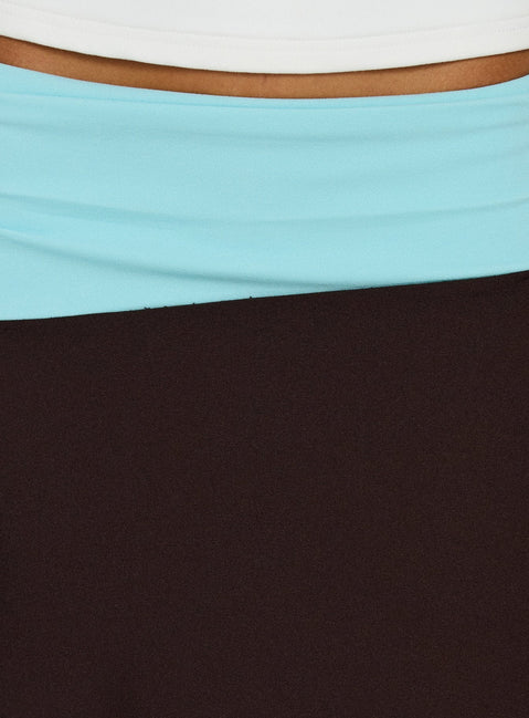 Featuring the Suave Asymmetrical Contrast Midi Skirt Brown / Aqua womens-skirts in midi length view of model wearing Princess Polly