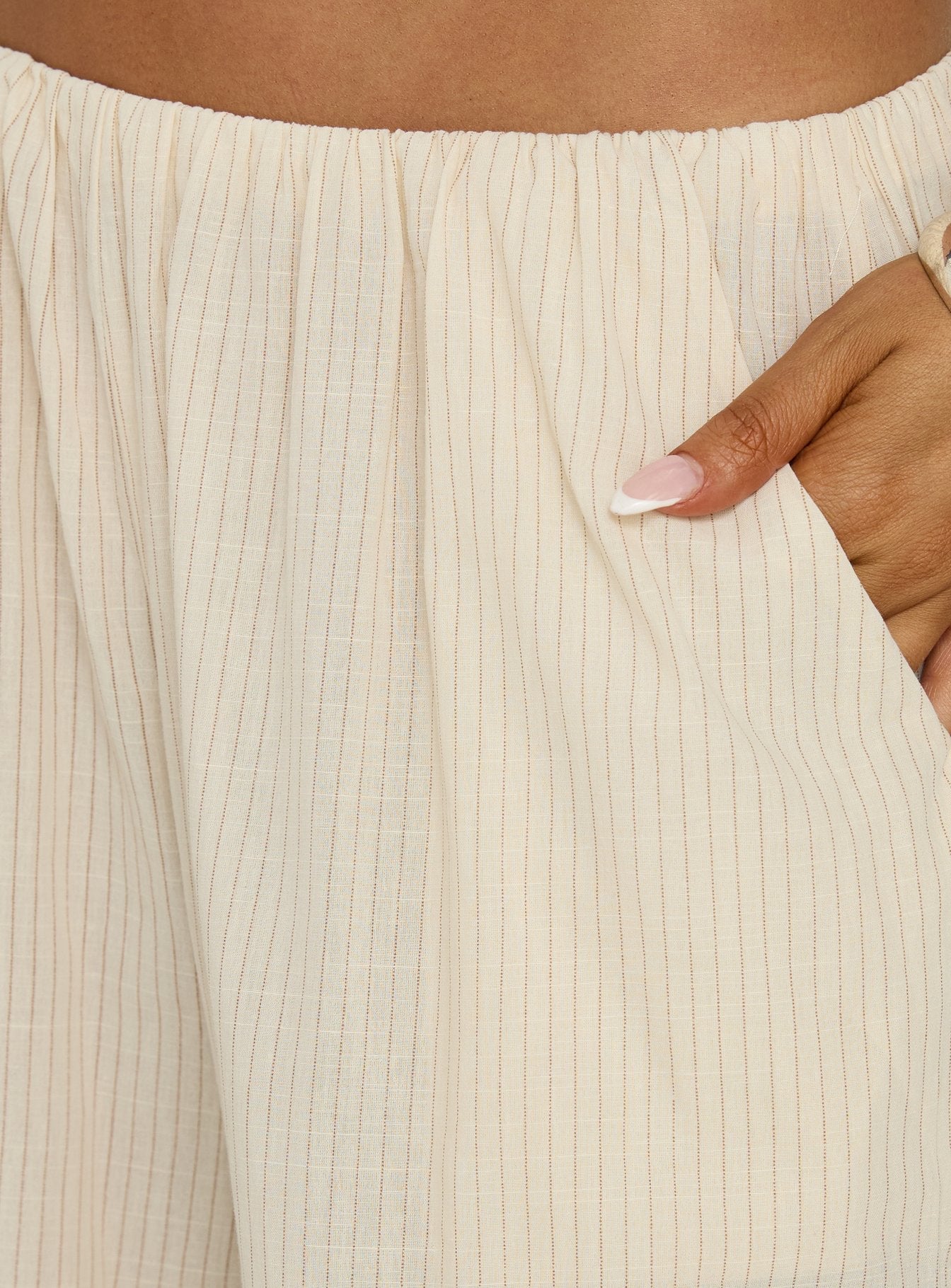 side view of model wearing Princess Polly Lunea Concealed Waistband Pants Beige Stripe Low Rise Pants Pants 