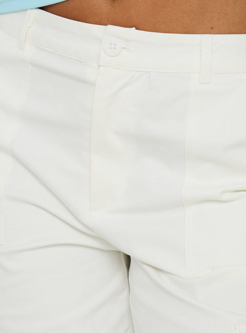 Featuring the Alfonza Utility Capri White womens-regular-pants in mid-rise cargo style front view of model wearing Princess Polly