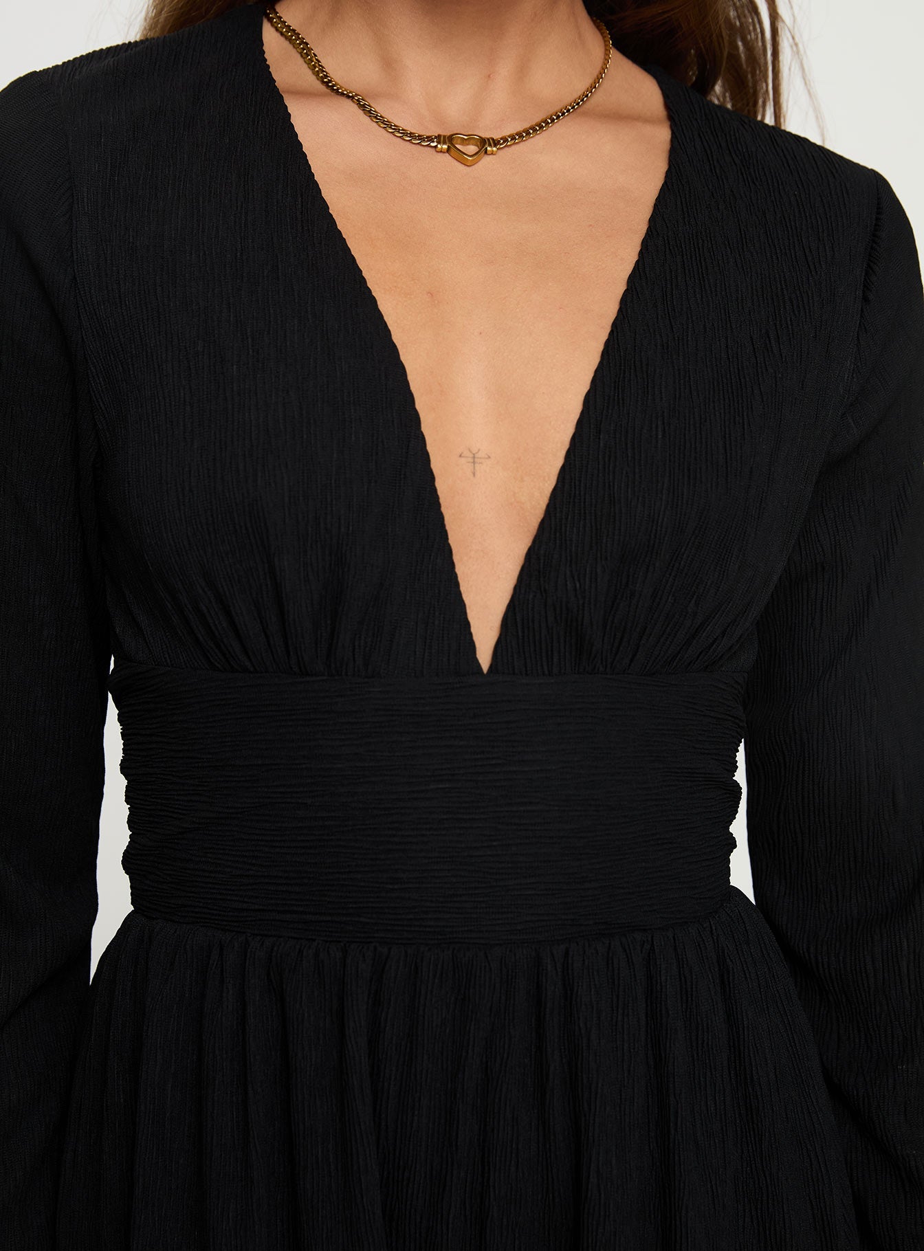 Long sleeve playsuit Plunging neckline, flared sleeves, tie fastening at back Good stretch, fully lined 