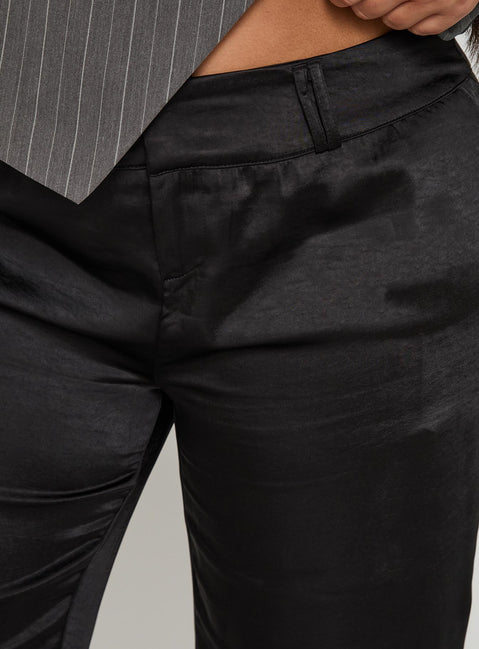 back view of model wearing Princess Polly First Place Low Rise Satin Pant Black Curve Low Rise Pants 