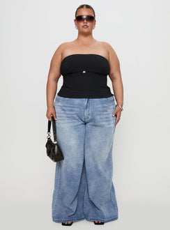 front view of model wearing Princess Polly Naylor Wide Leg Jeans Light Wash Denim Curve Mid Rise 