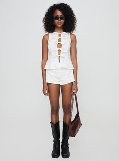 front view of model wearing Princess Polly Luminary Tie Up Top White Sleeveless Crew Neck 