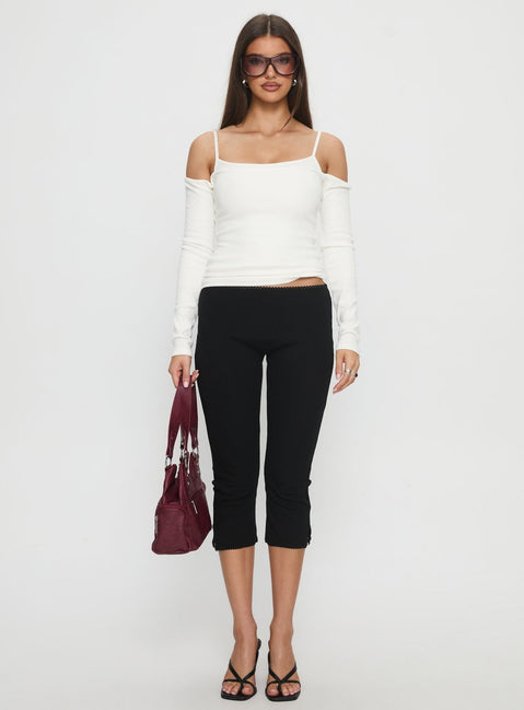 front view of model wearing Princess Polly Baseline Rib Capri Pants Black High Rise Pants 