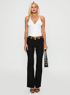 front view of model wearing Princess Polly True Grit Eyelet Flare Pants Black Low Rise Pants 