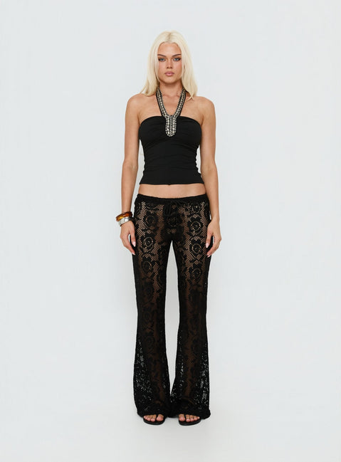 side view of model wearing Princess Polly Rosadonna Lace Flare Pants Black Low Rise Pants 