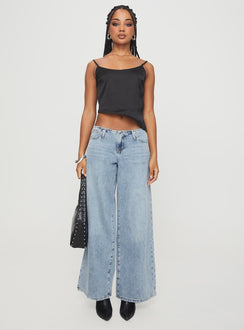 side view of model wearing Princess Polly Olivette Top Black Sleeveless Scoop Neck 