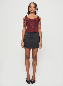 front view of model wearing Princess Polly Rehna Top Red Floral Sleeveless V-Neck 