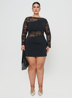 side view of model wearing Princess Polly Covington Long Sleeve Mini Dress Black Curve Crew Neck 