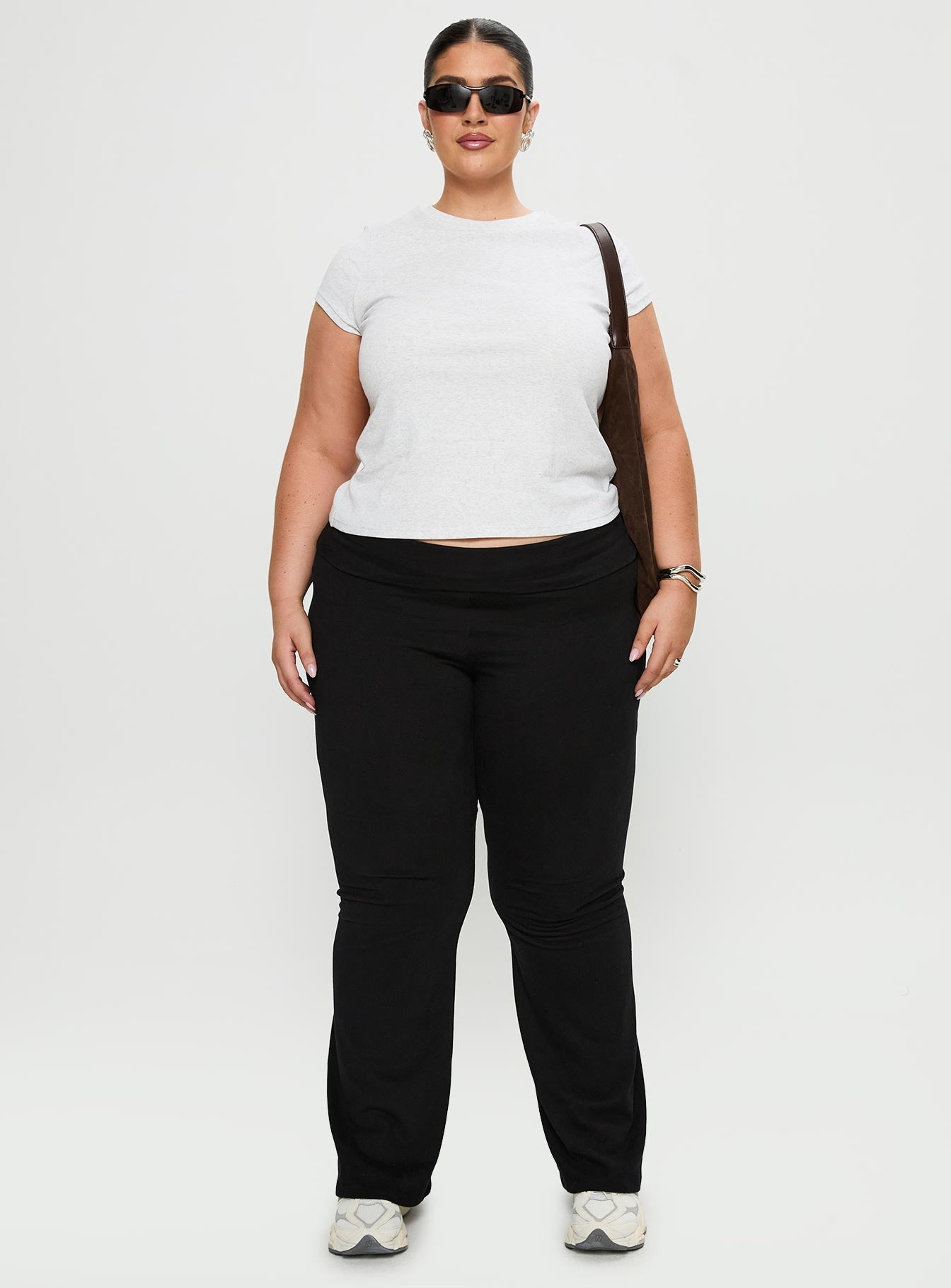 front view of model wearing Princess Polly Movement Yoga Pant Black Curve High Waisted Pants 