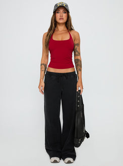 front view of model wearing Princess Polly Ezekiel Nylon Top Red Sleeveless Scoop Neck 