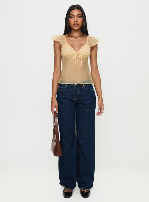 front view of model wearing Princess Polly Keysia Cap Sleeve Sheer Top Apricot Short Sleeves Plunger 