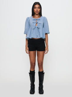 side view of model wearing Princess Polly Full House Tie Up Blouse Top Blue Plaid Half Sleeves Crew Neck 