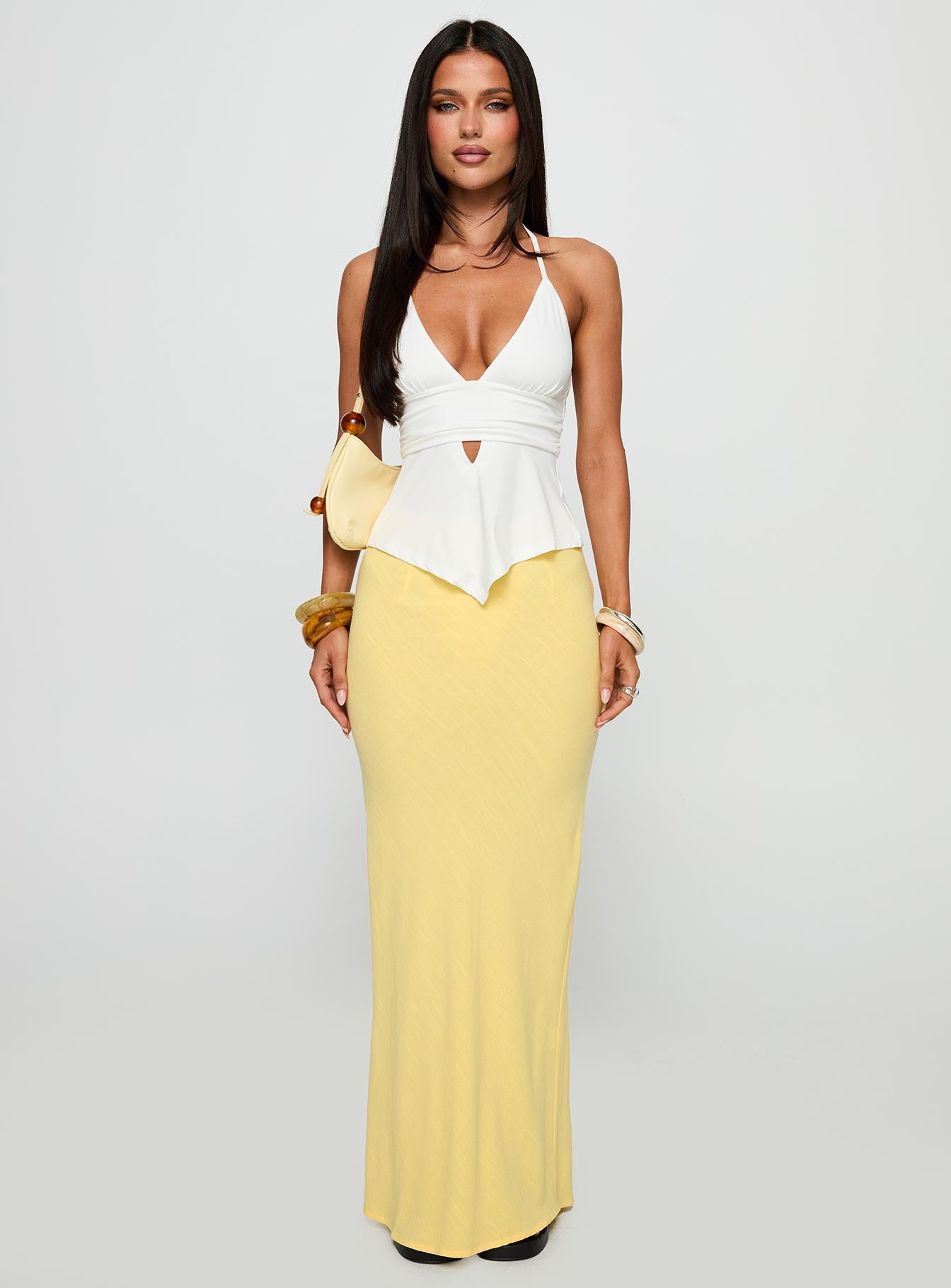   front view of model wearing Princess Polly Jodie Maxi Skirt Lemon Yellow Maxi Skirts Skirts 