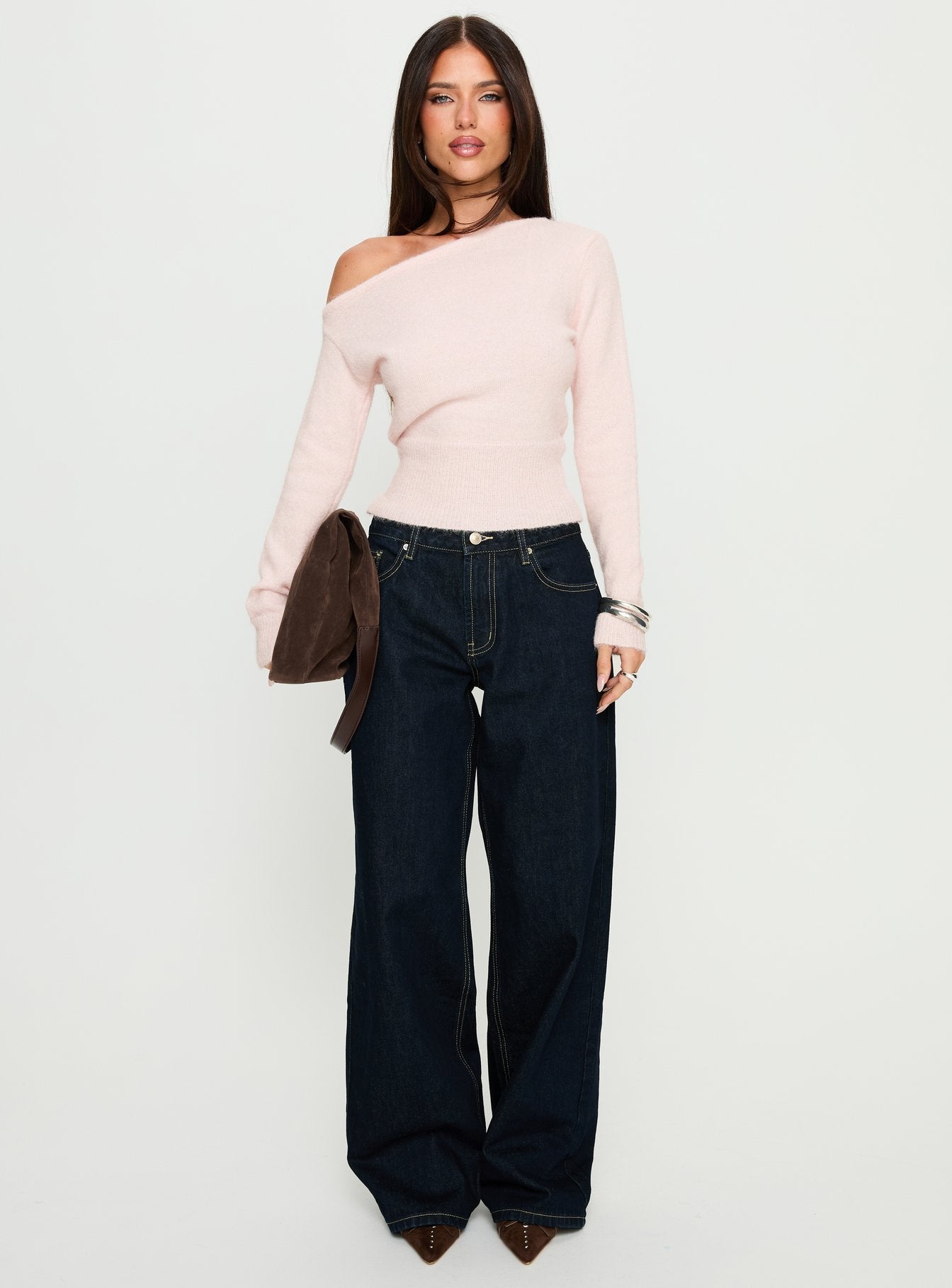 side view of model wearing Princess Polly Serenitia Mid Rise Relaxed Jeans Dark Raw Wash Mid Rise Jeans 
