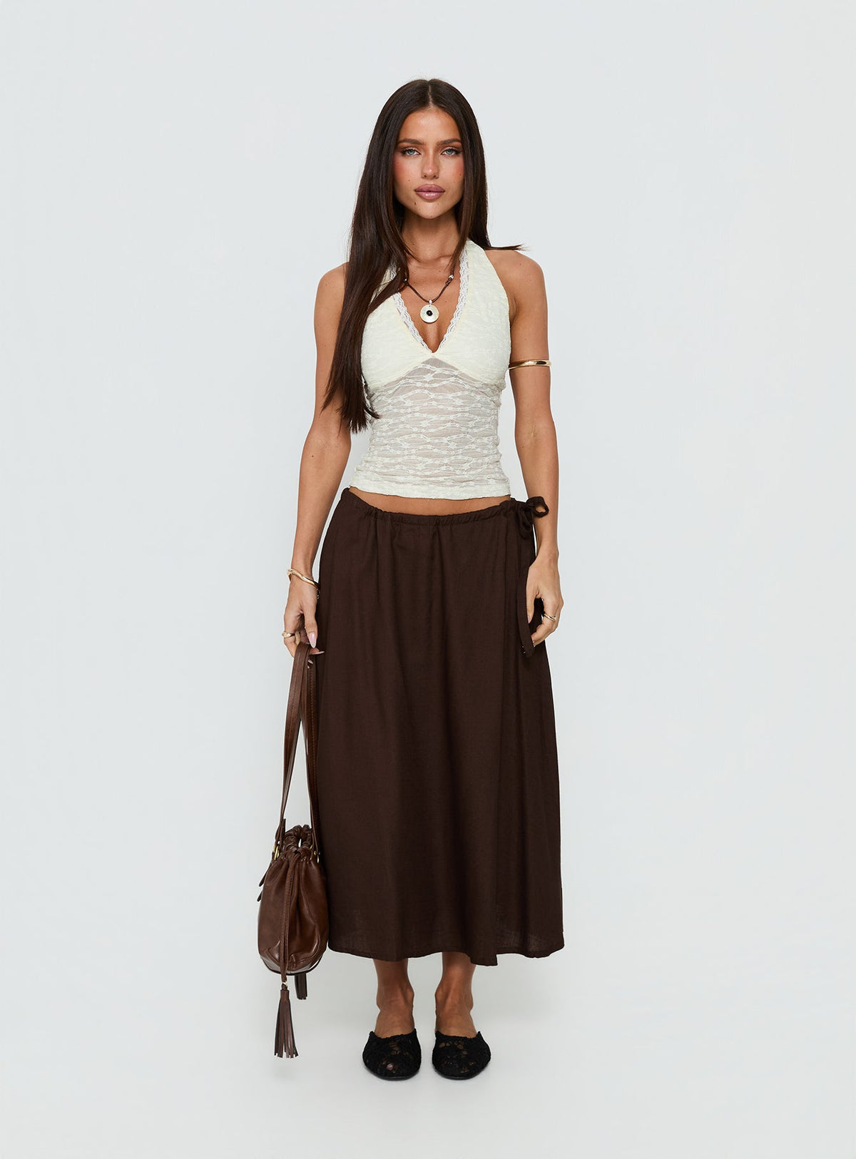   side view of model wearing Princess Polly Persuasion Tie Side Midi Skirt Chocolate Midi Skirts Skirts 