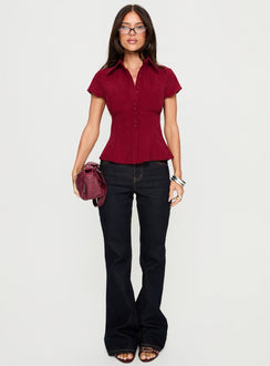 front view of model wearing Princess Polly Magic Mirror Mid Rise Bootleg Jeans Raw Indigo Mid Rise Jeans Jeans 