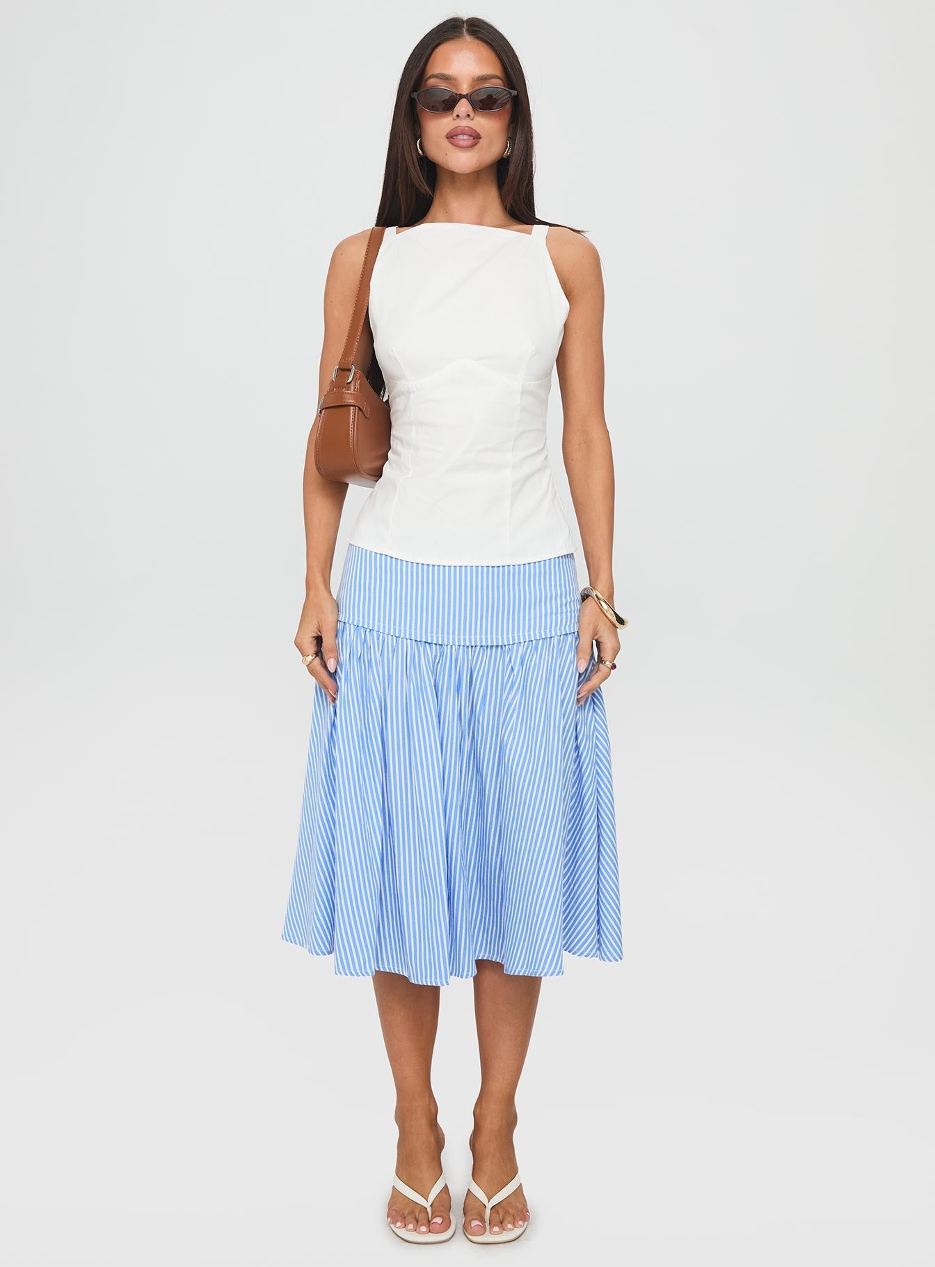   front view of model wearing Princess Polly Raelan Tiered Midi Skirt Blue Stripe Midi Skirts 