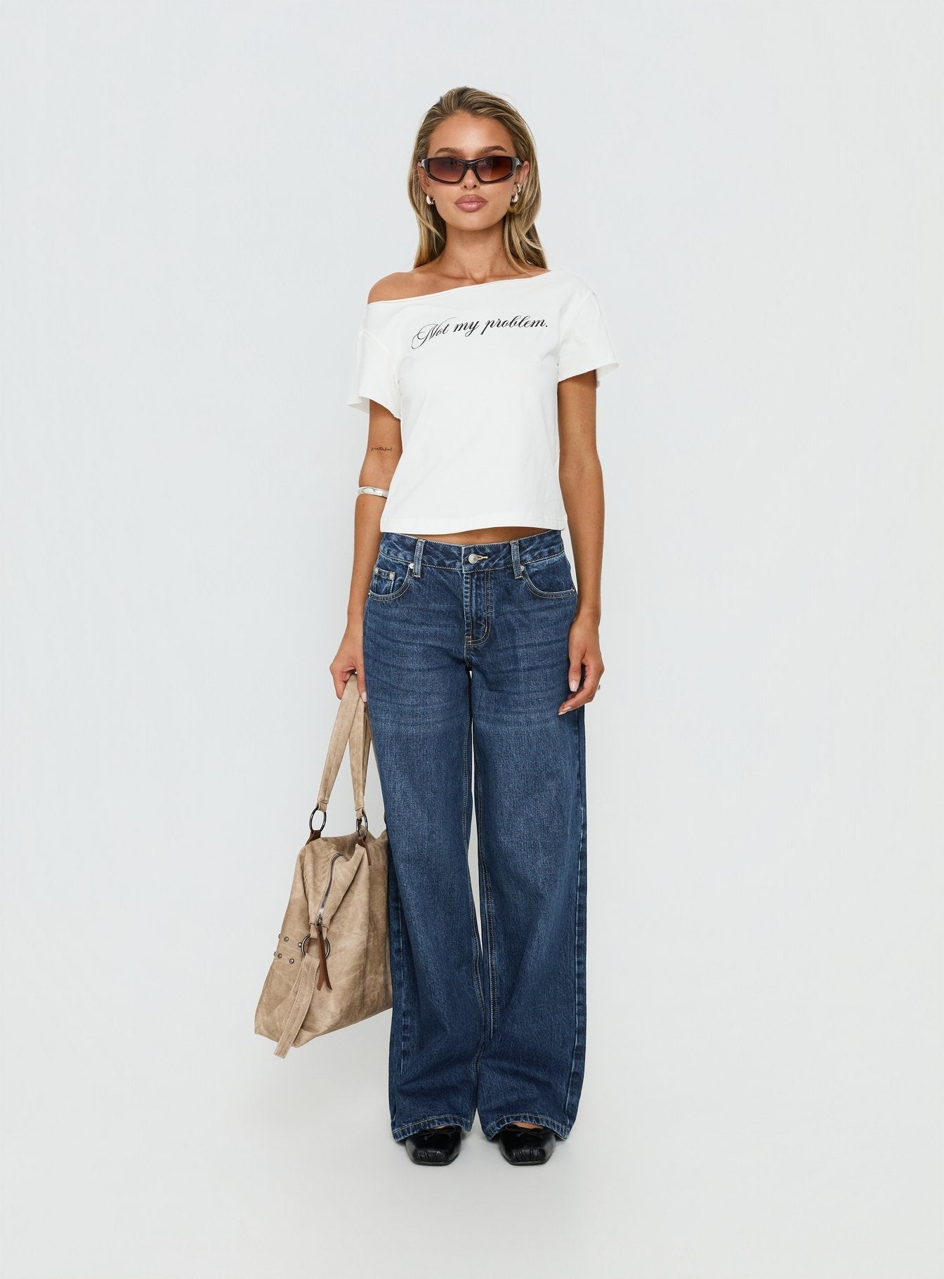 Not My Problem Loose Graphic Baby Tee White