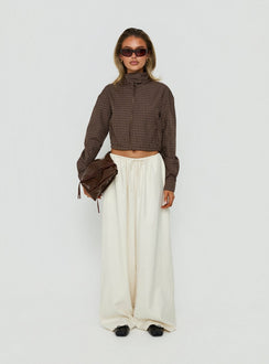 Showcasing the Bungala Oversized Relaxed Pants Ivory womens-regular-pants in high-rise wide-leg silhouette front view of model wearing Princess Polly