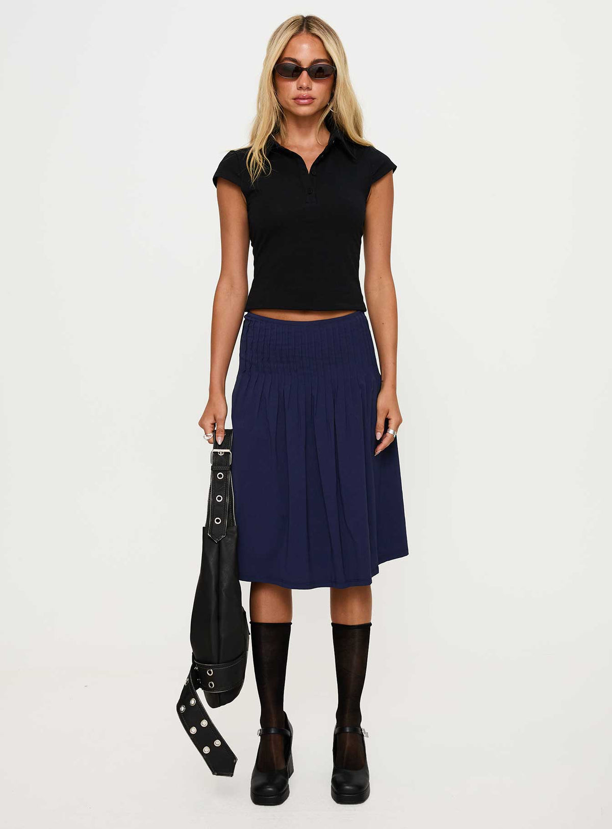   front view of model wearing Princess Polly Elaila Pleat Midi Skirt Navy Midi Skirts Skirts 