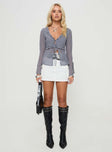 Long sleeve top  Plunging neckline, frill trim, double tie front fastening, tie detail at cuffs Non-stretch, lined bust 