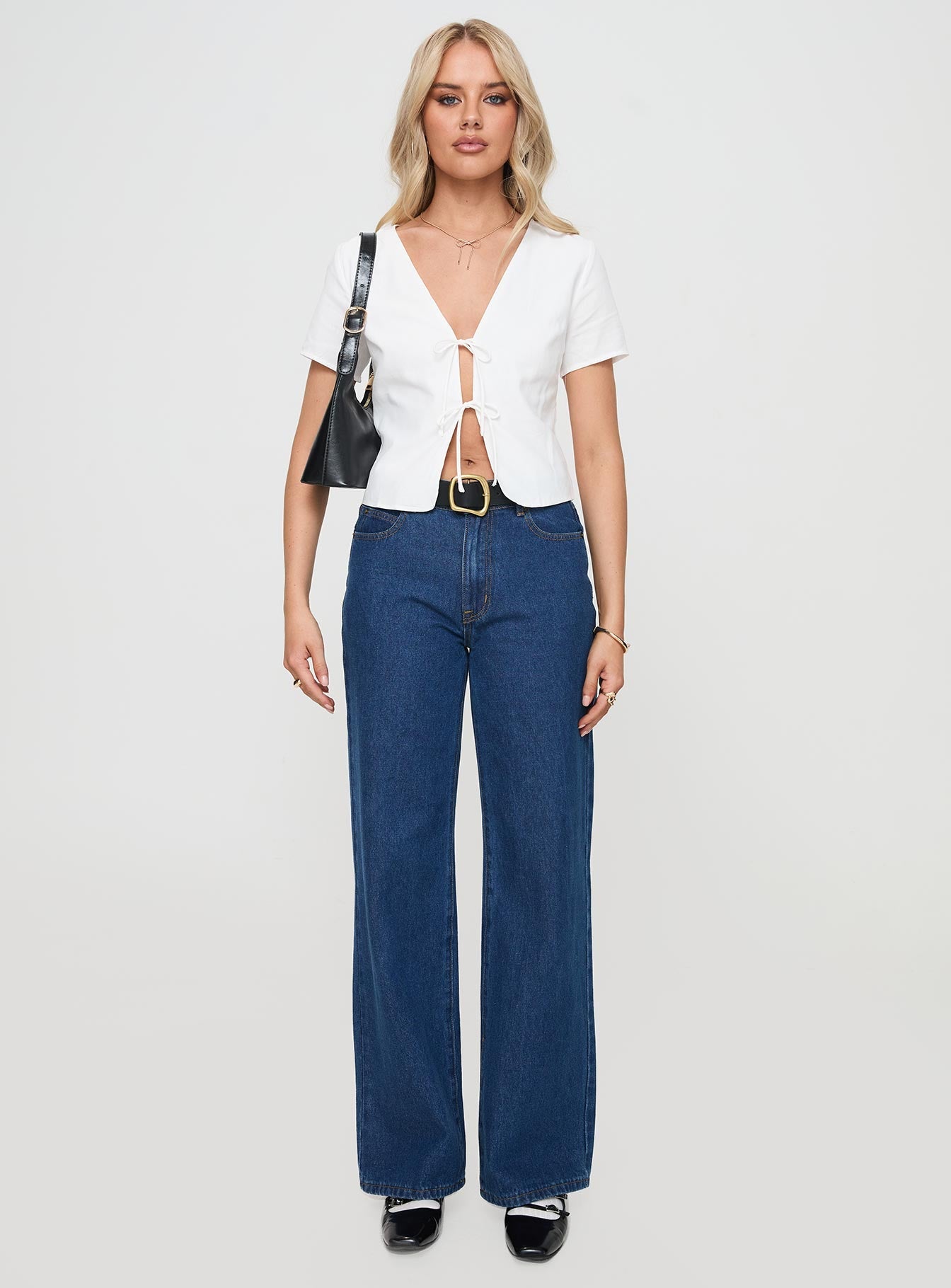 front view of model wearing Princess Polly Corriander Shirt White Short Sleeves V-Neck 