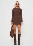 Long sleeve mini dress Boucle material, low back, sheer knit, tie fastening at back  Good stretch, unlined 