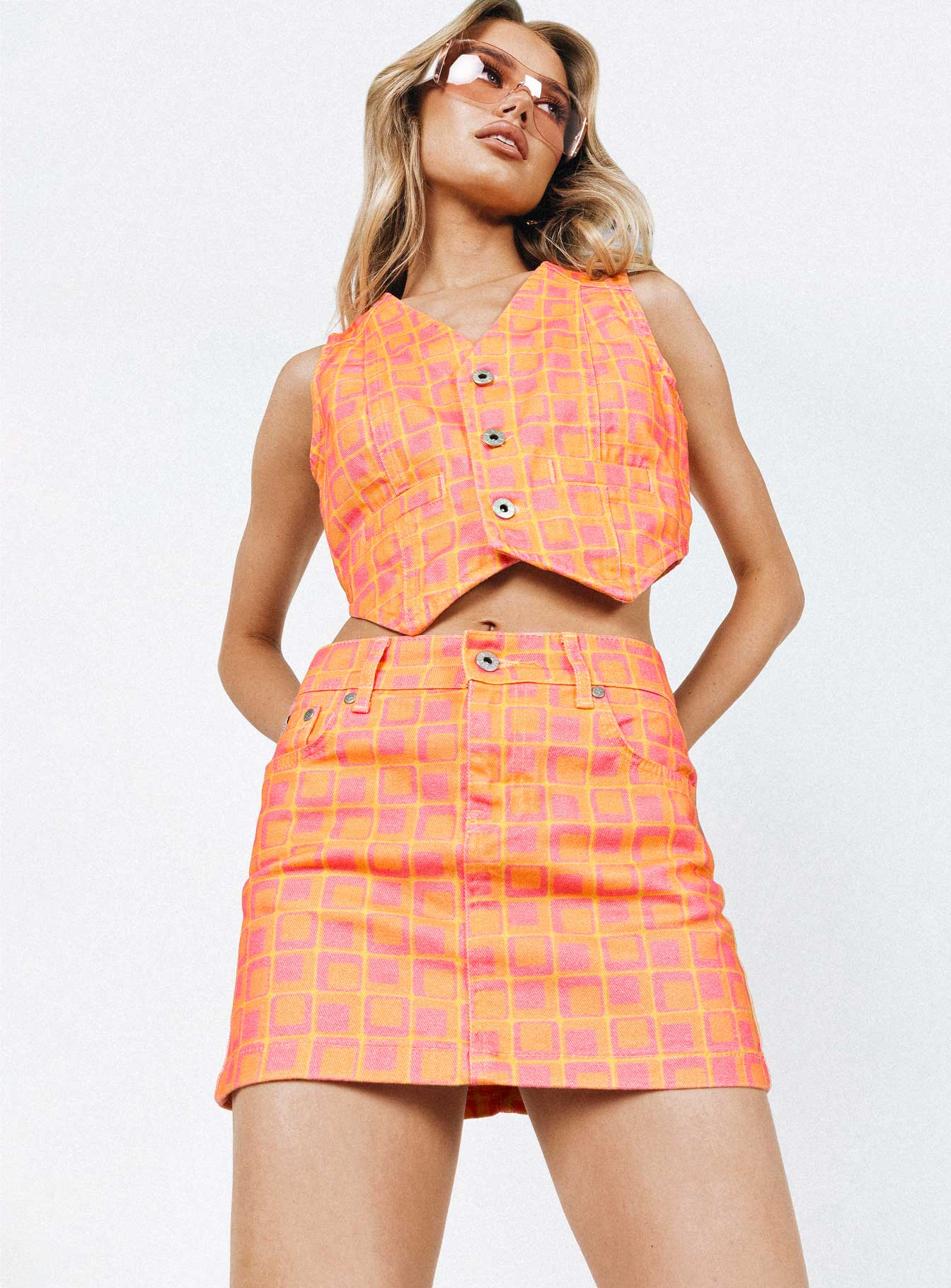   front view of model wearing Princess Polly The Ragged Priest Doll Mini Skirt Orange Mini Skirts 