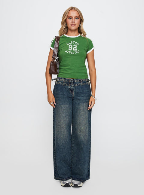 front view of model wearing Princess Polly Baccarat Belted Denim Pant Dark Blue Low Rise Jeans 