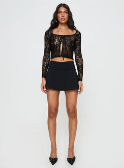 Black Long sleeve lace top Scooped neckline, tie & button fastening at bust, split hem