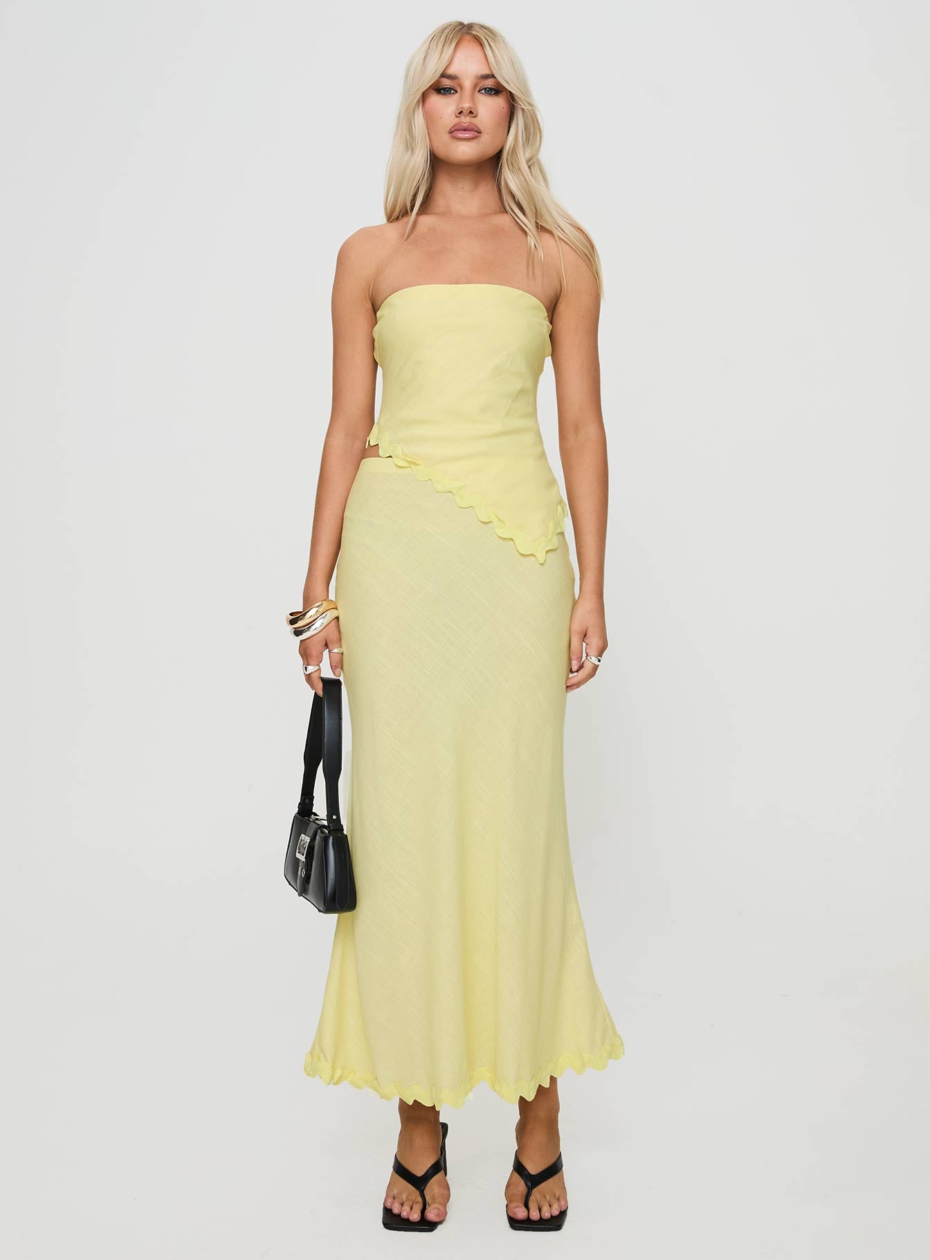   front view of model wearing Princess Polly Silvershore Maxi Skirt Yellow Maxi 