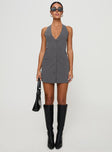 Mini dress Halter style, v neckline, faux twin hip pockets, button fastening  Non-stretch material, unlined 