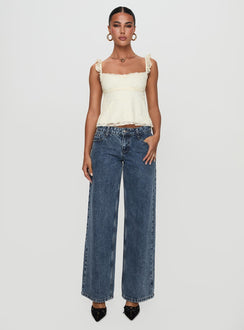 side view of model wearing Princess Polly Madaleine Lace Top Cream Sleeveless Square Neck 