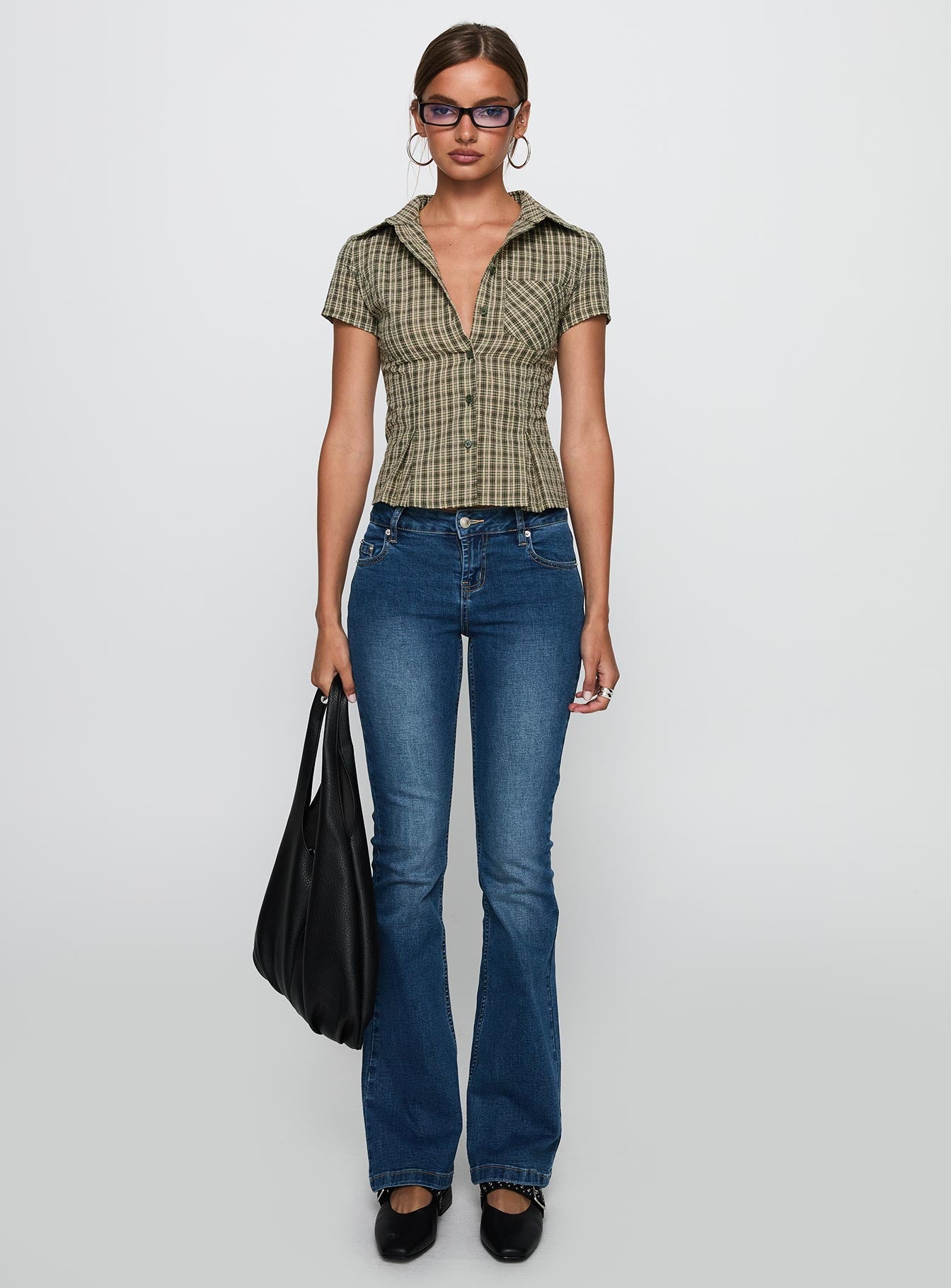 side view of model wearing Princess Polly Alma Mater Top Green Check Short Sleeves V-Neck 