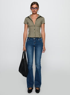 side view of model wearing Princess Polly Alma Mater Top Green Check Short Sleeves V-Neck 