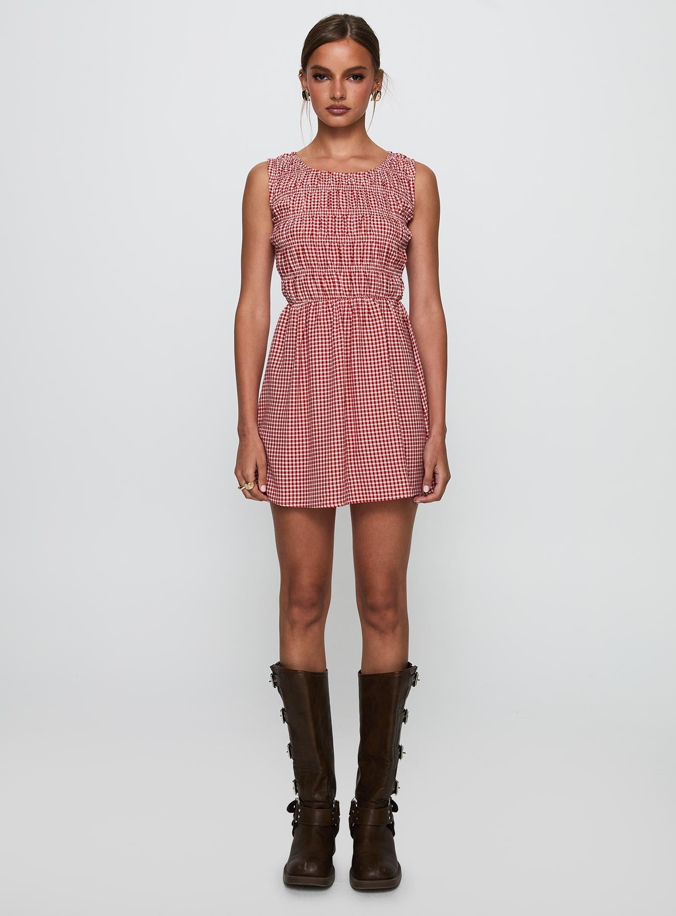 side view of model wearing Princess Polly Winxie Shirred Mini Dress Red Gingham Scoop Neck 