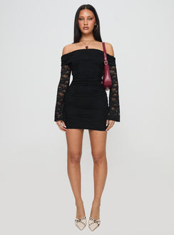 front view of model wearing Princess Polly Fable Off The Shoulder Mini Dress Black Straight Neck 