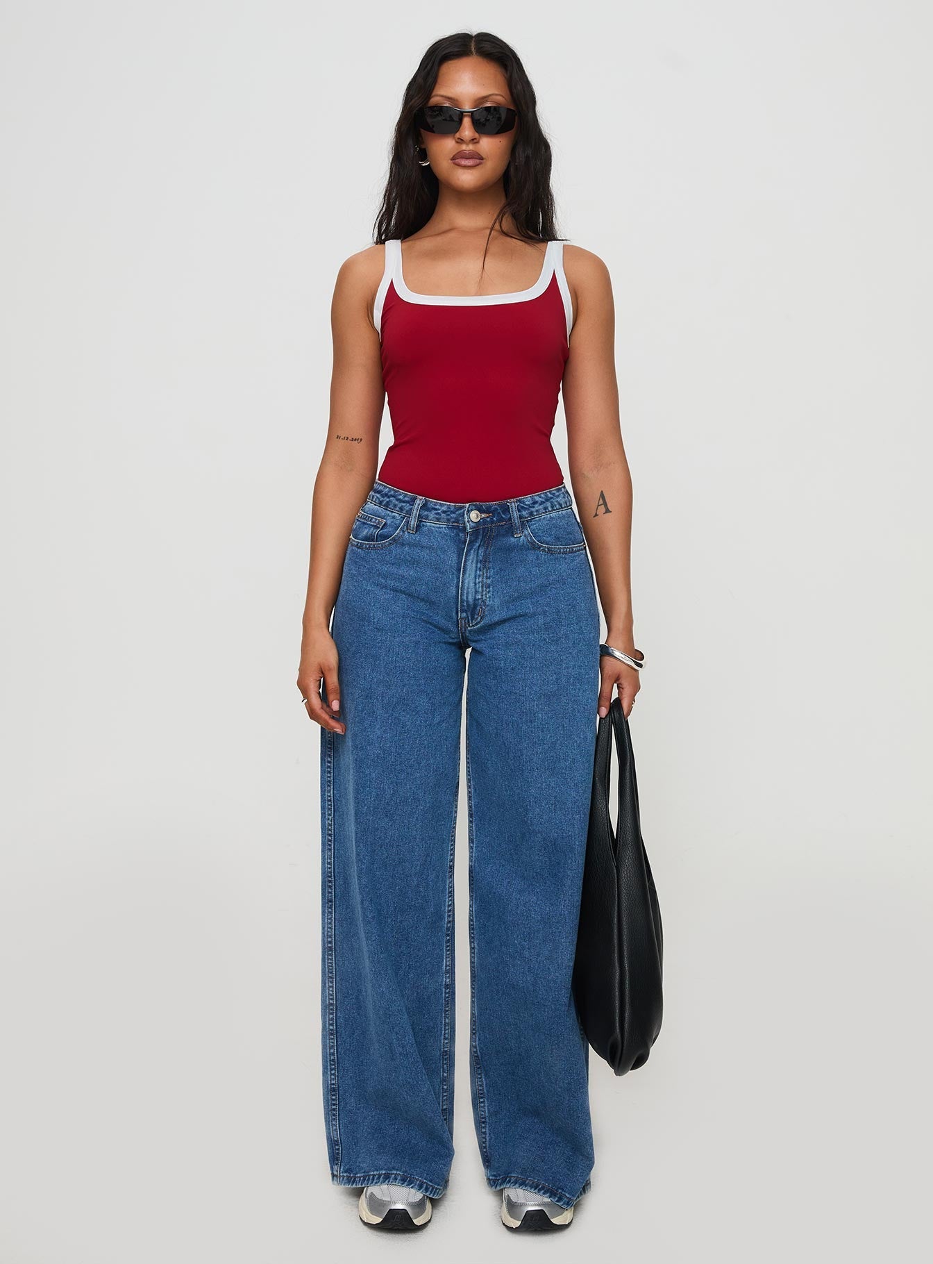 side view of model wearing Princess Polly Astrea Bodysuit Red / White Sleeveless Scoop Neck 