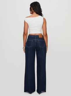 back view of model wearing Princess Polly Darla Low Rise Straight Jean Dark Wash Petite Low Rise Jeans 