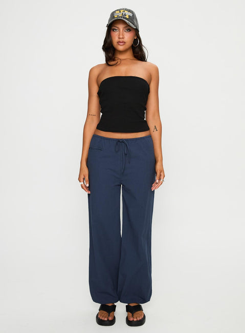 front view of model wearing Princess Polly Zodie Low Waist Pants Navy Low Rise Pants 