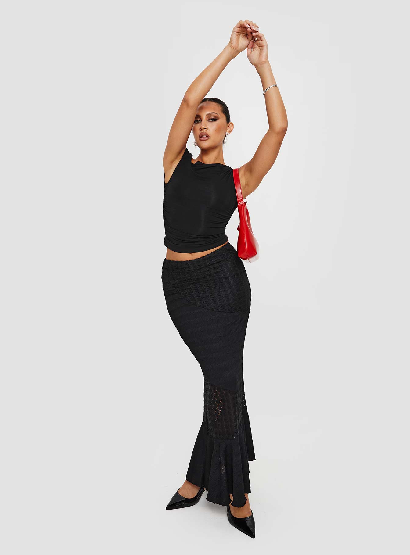 Bias cut maxi skirt, mid-rise, textured material Thin elasticated waistband, frill hem Good stretch, fully lined 